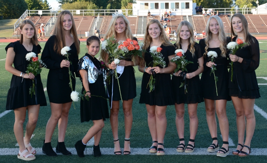 group of girls in black dresses